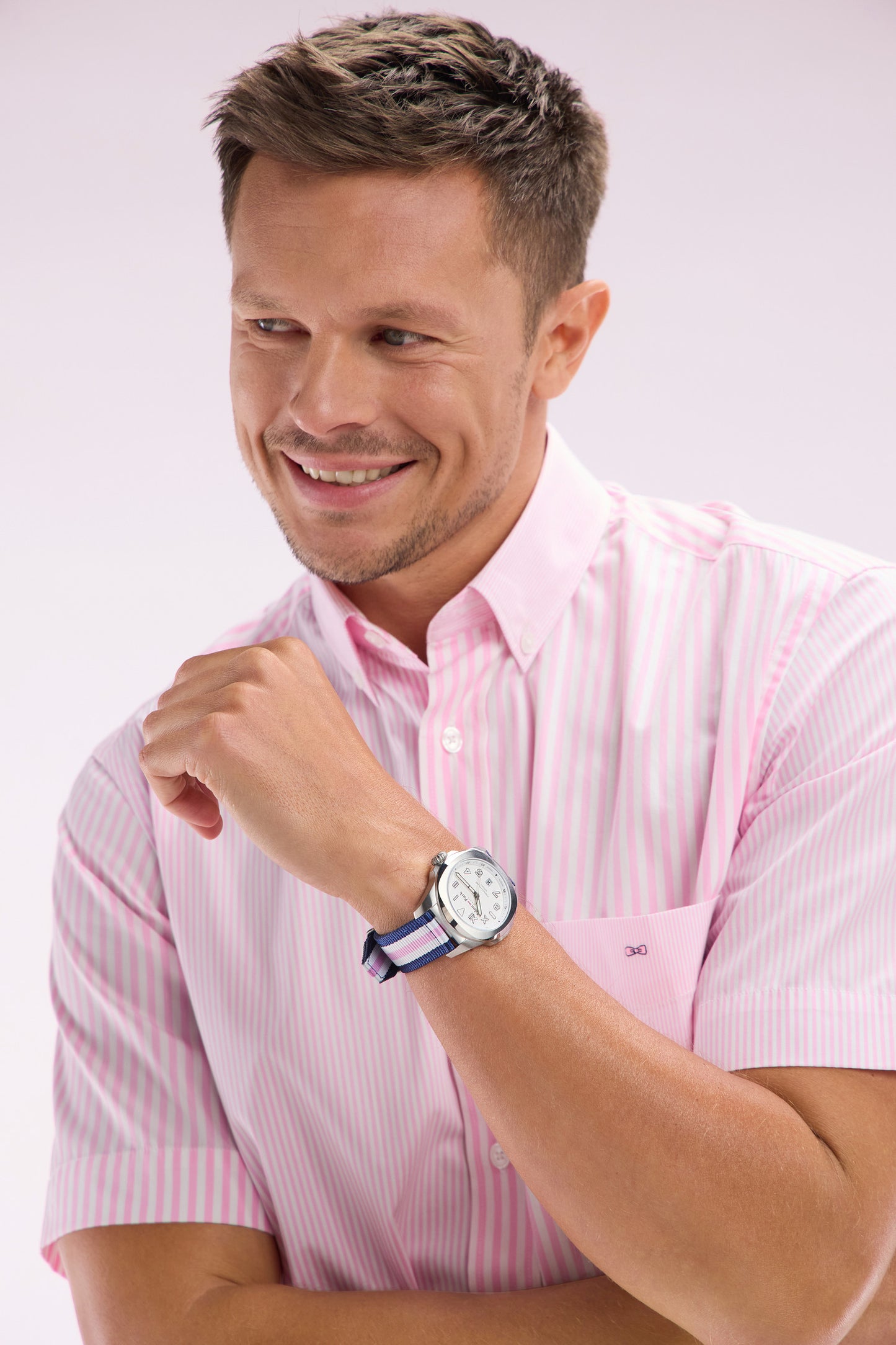 Quartz watch with white background striped NATO strap