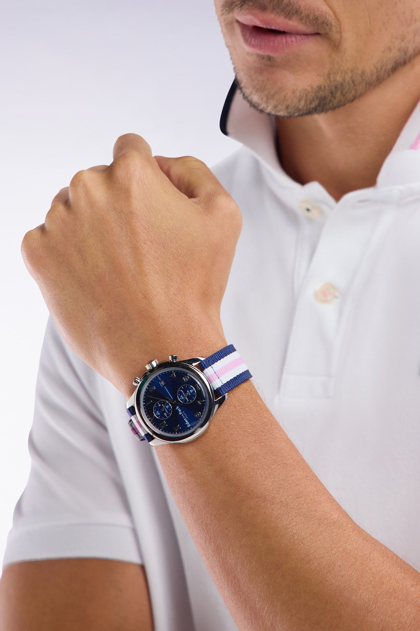 Quartz chronograph watch blue background tricolor striped NATO strap