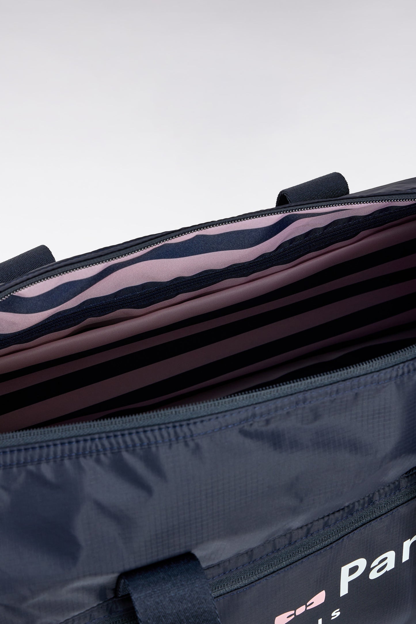 Navy blue duffle bag with Eden Park logo