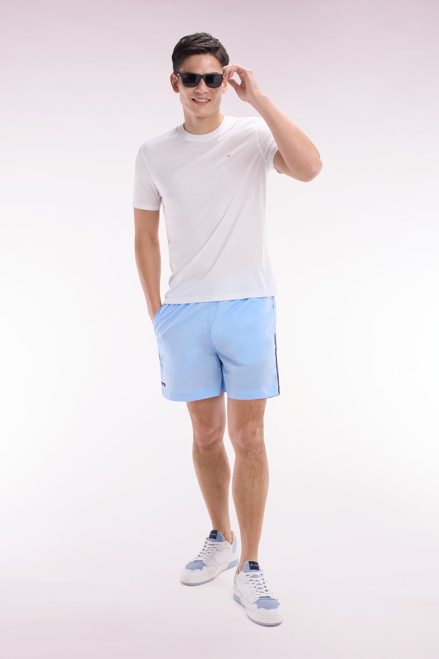 Sky blue swimsuit with tricolor details