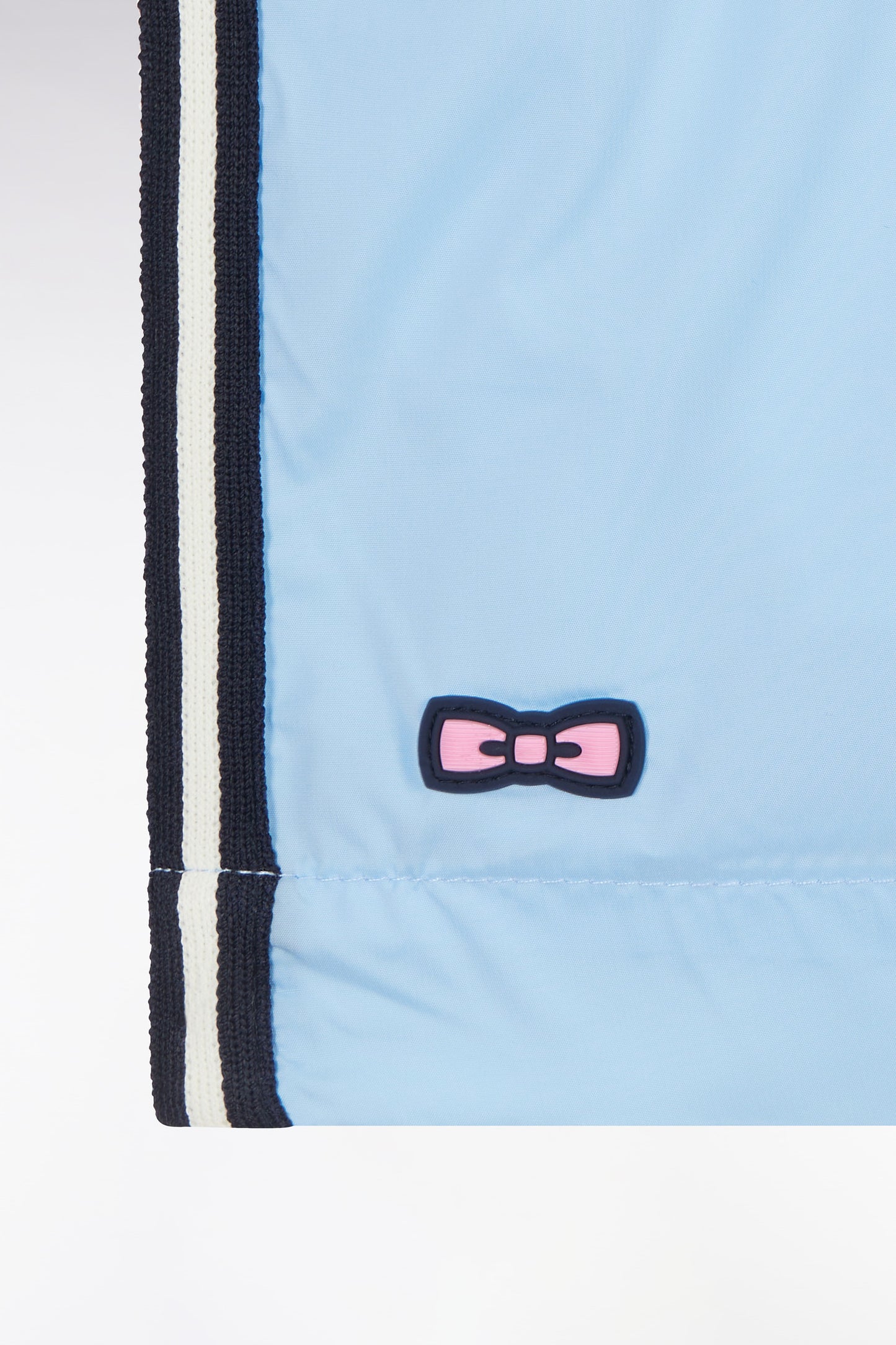 Sky blue swimsuit with tricolor details