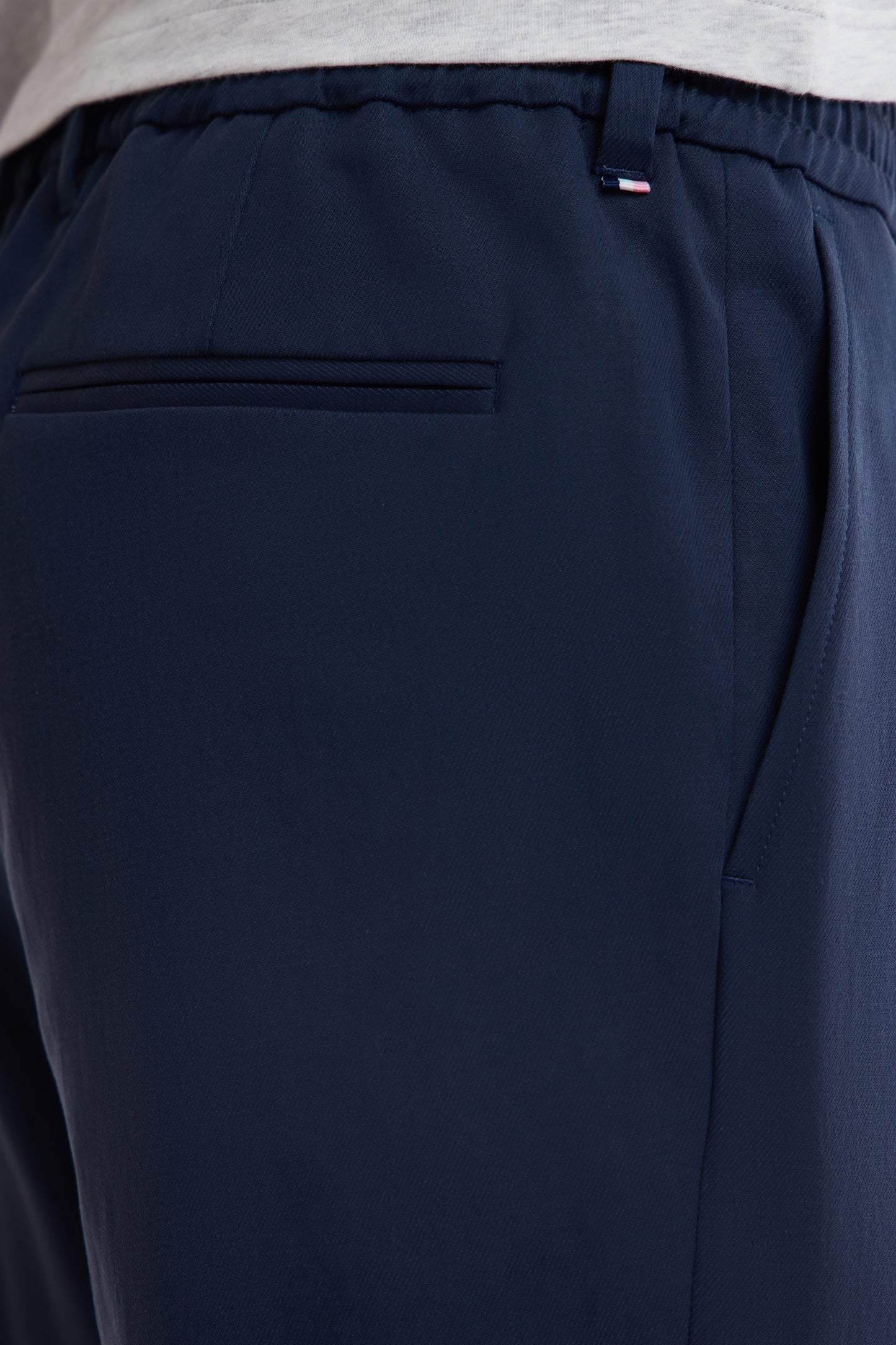 Elastic trousers in navy lyocell and stretch cotton