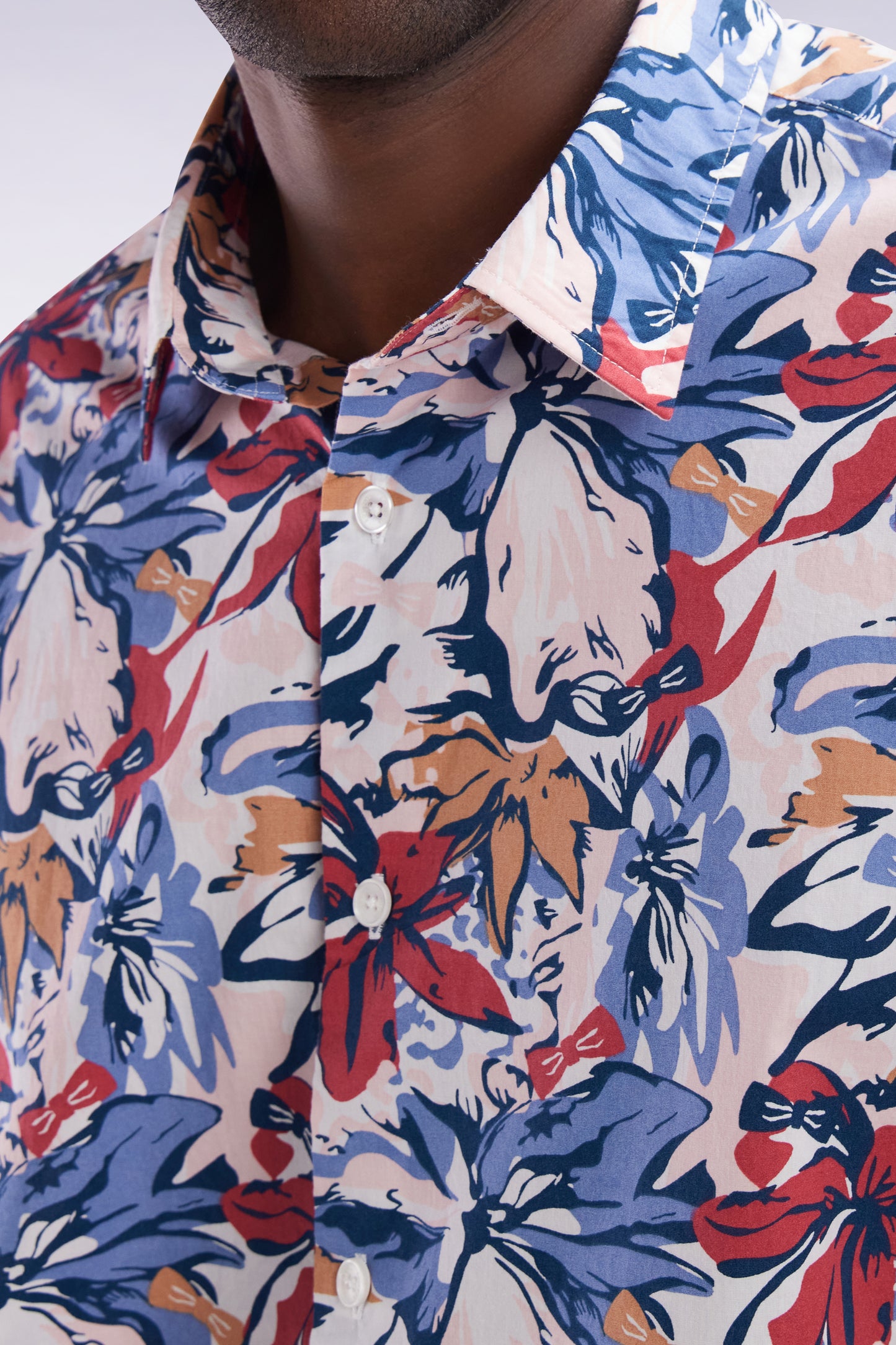 Straight-fit cotton poplin shirt with tropical bow tie print