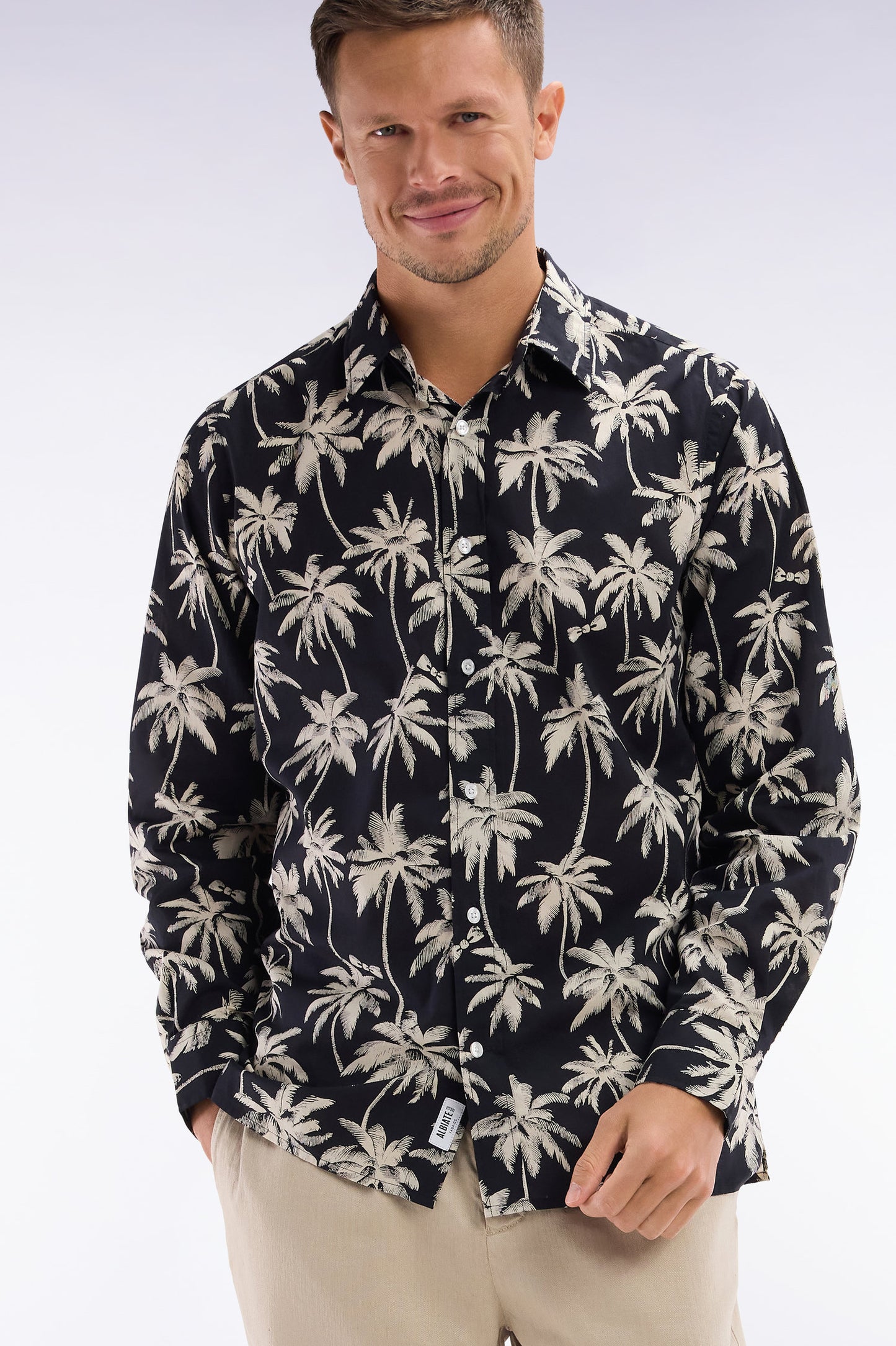 Straight-fit black cotton shirt with palm tree print