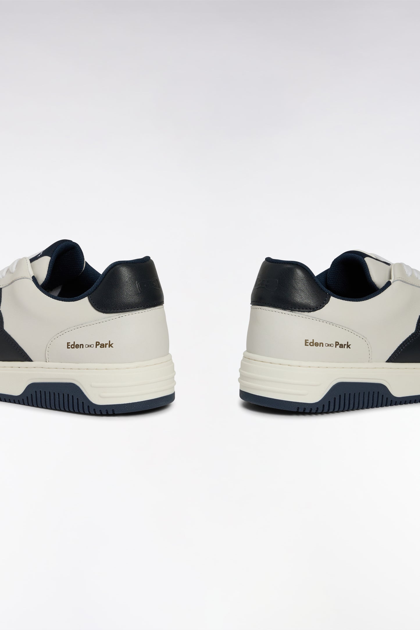 White leather sneakers with black details