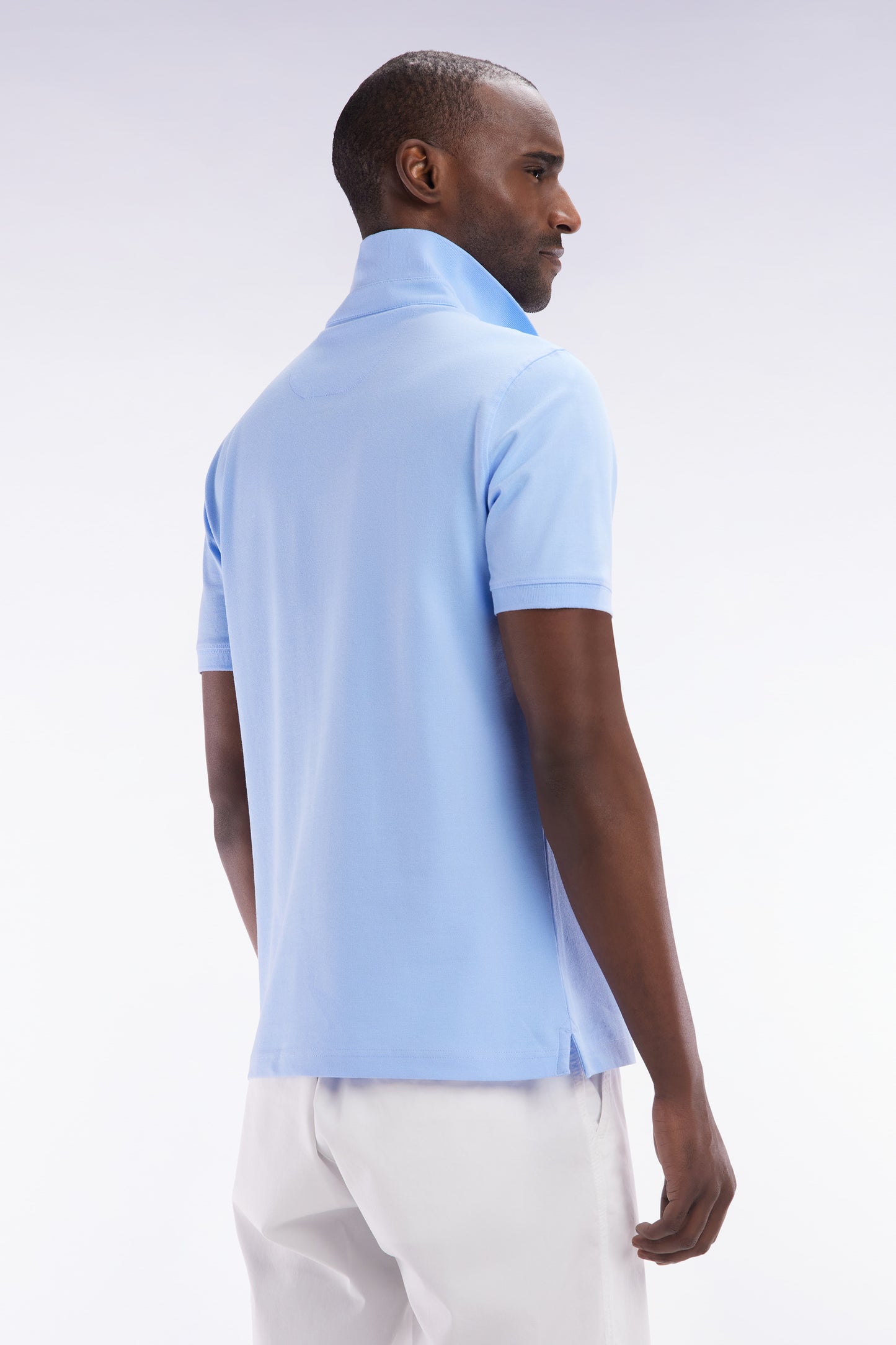 Slim-fit short-sleeved polo shirt in blue stretch cotton piqué
