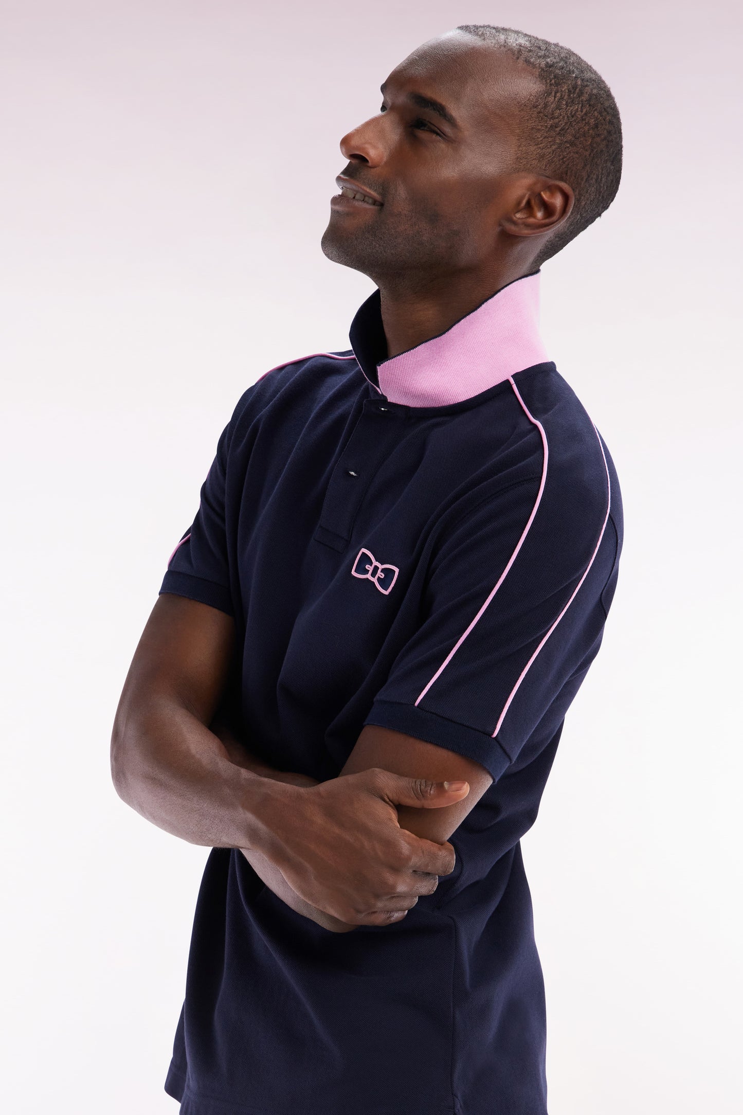 Straight-fit short-sleeved polo shirt in navy cotton with contrasting piping