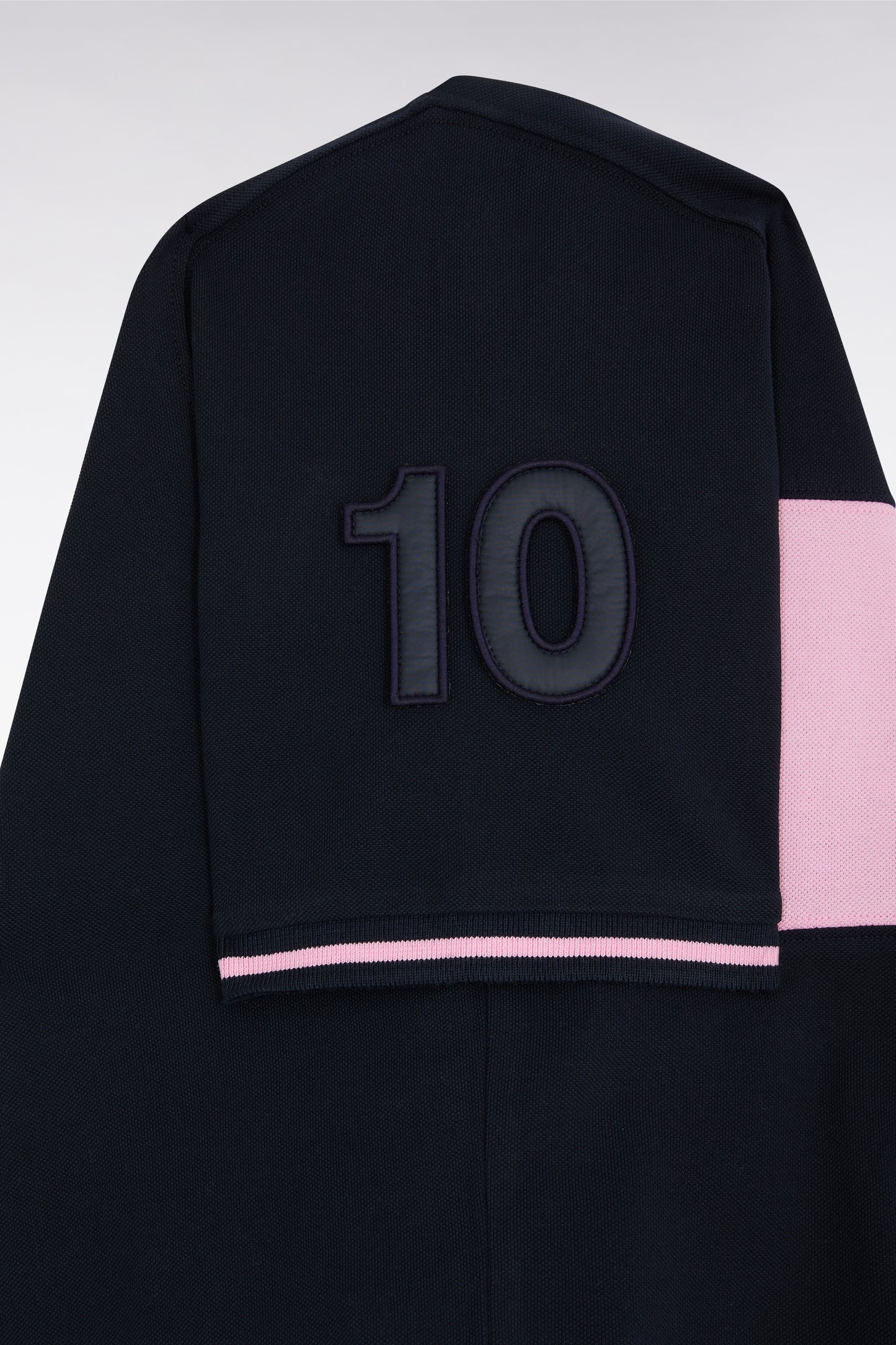 Relaxed-fit short-sleeved pink cotton piqué polo shirt with contrasting stripe