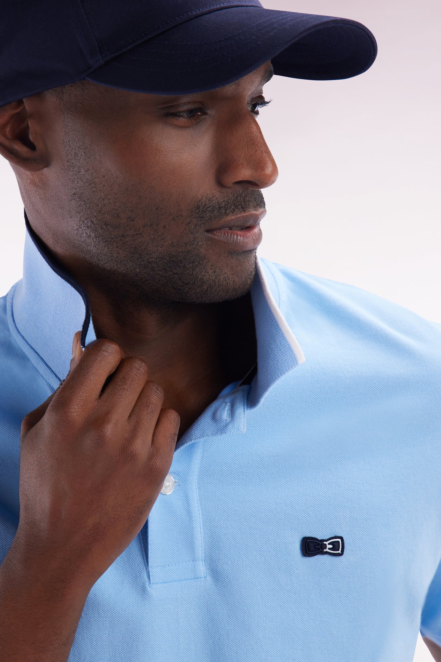 Relaxed-fit short-sleeved polo shirt in sky blue cotton with piped collar