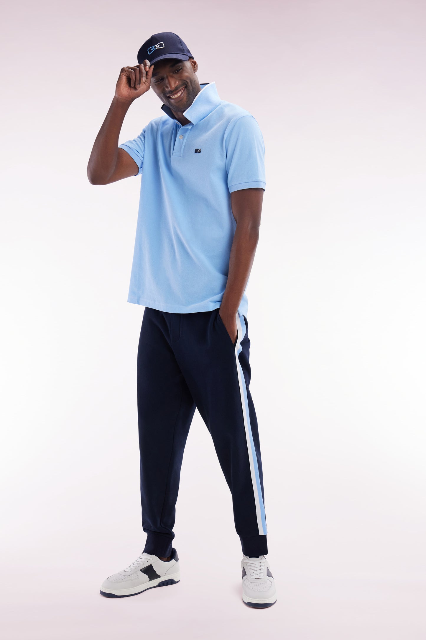 Relaxed-fit short-sleeved polo shirt in sky blue cotton with piped collar