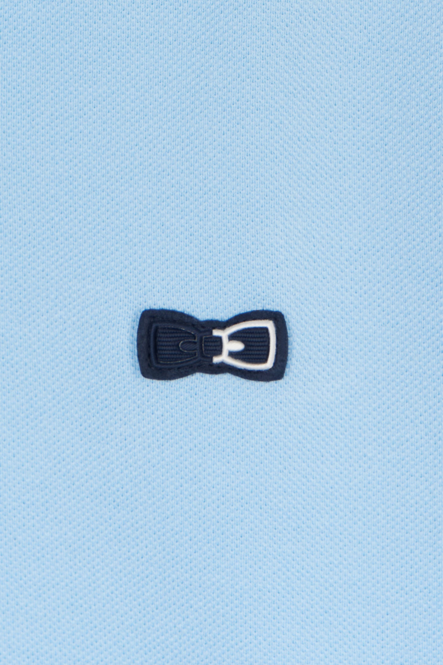 Relaxed-fit short-sleeved polo shirt in sky blue cotton with piped collar