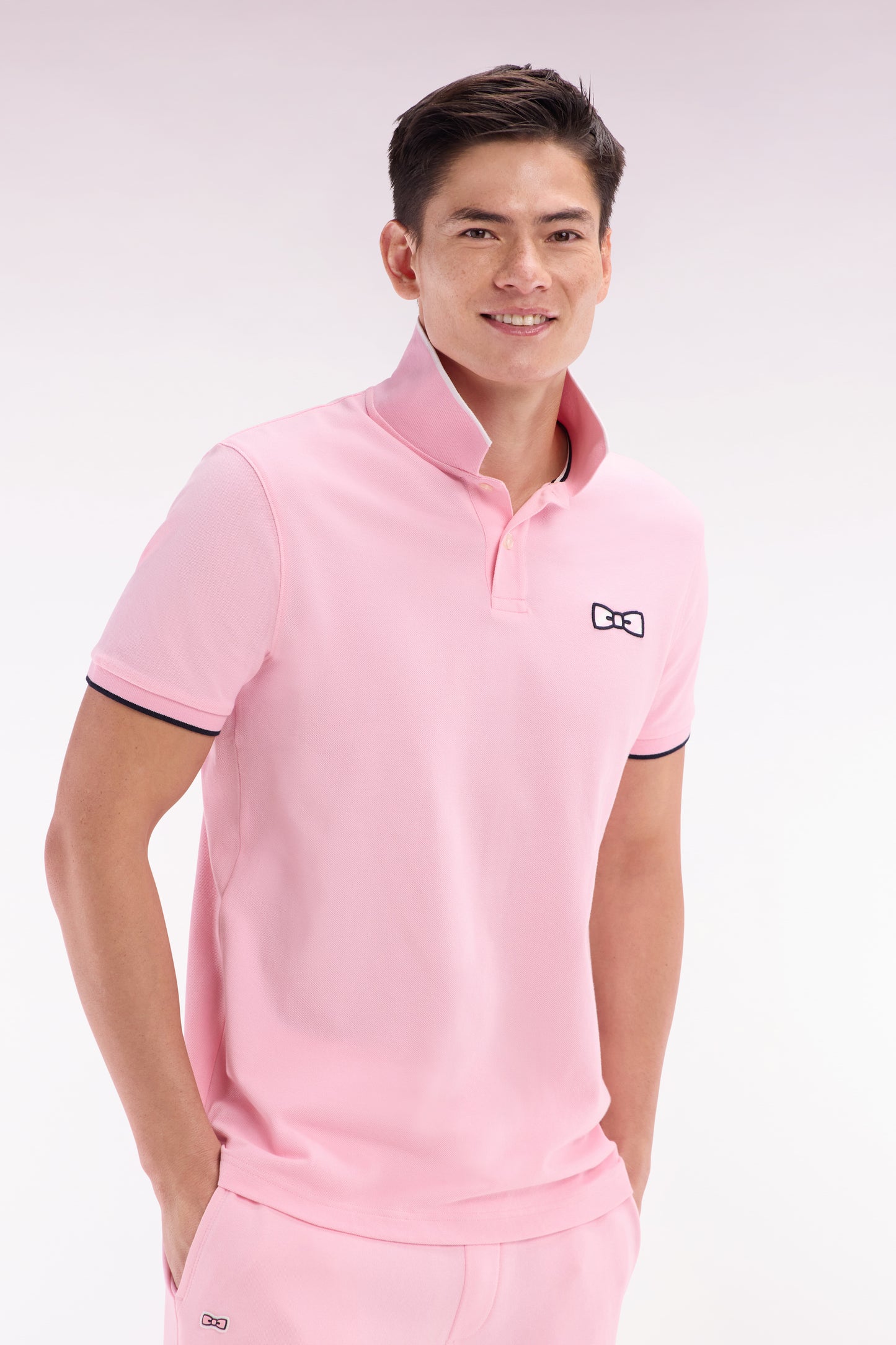 Relaxed-fit short-sleeved polo shirt in pink cotton with tone-on-tone embroidery