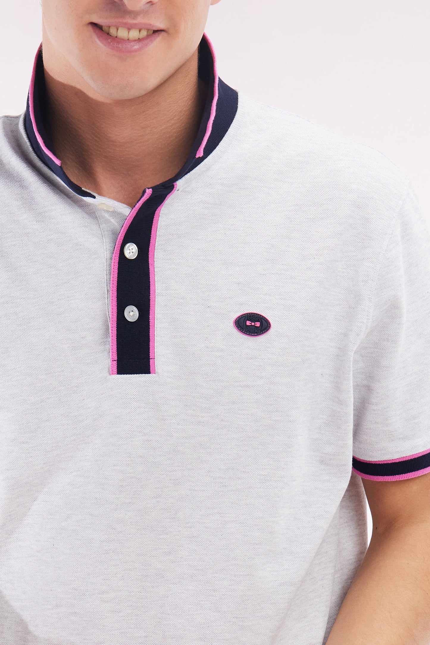 Relaxed-fit short-sleeved polo shirt in pink cotton with colorful stripes