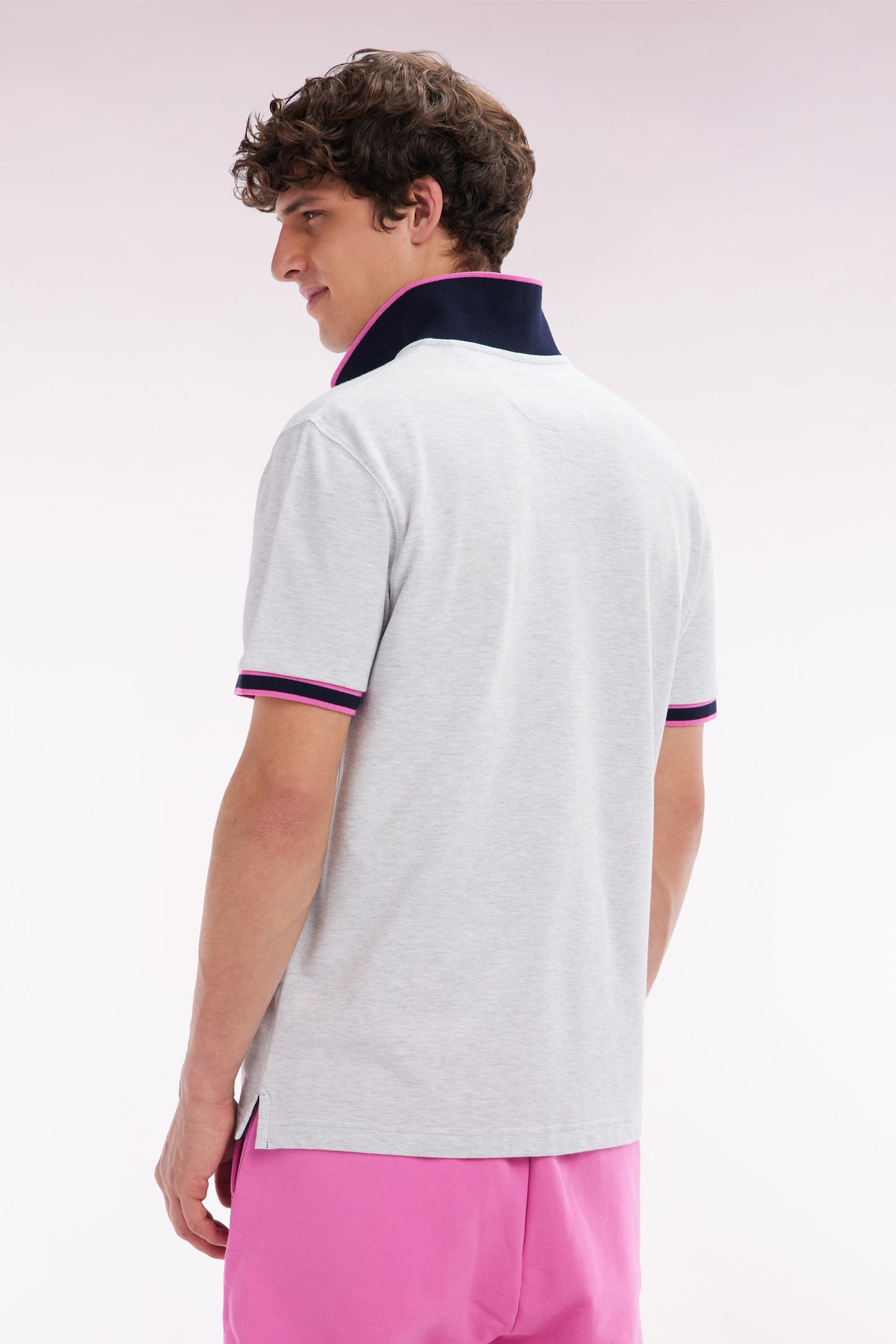 Relaxed-fit short-sleeved polo shirt in pink cotton with colorful stripes