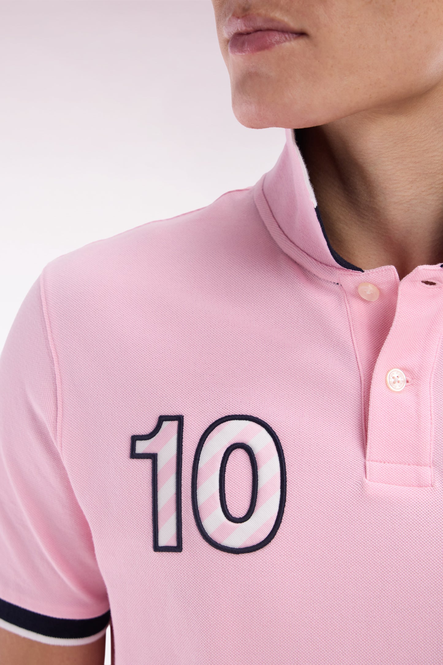 Relaxed-fit short-sleeved polo shirt in pink cotton with 10 embroidery