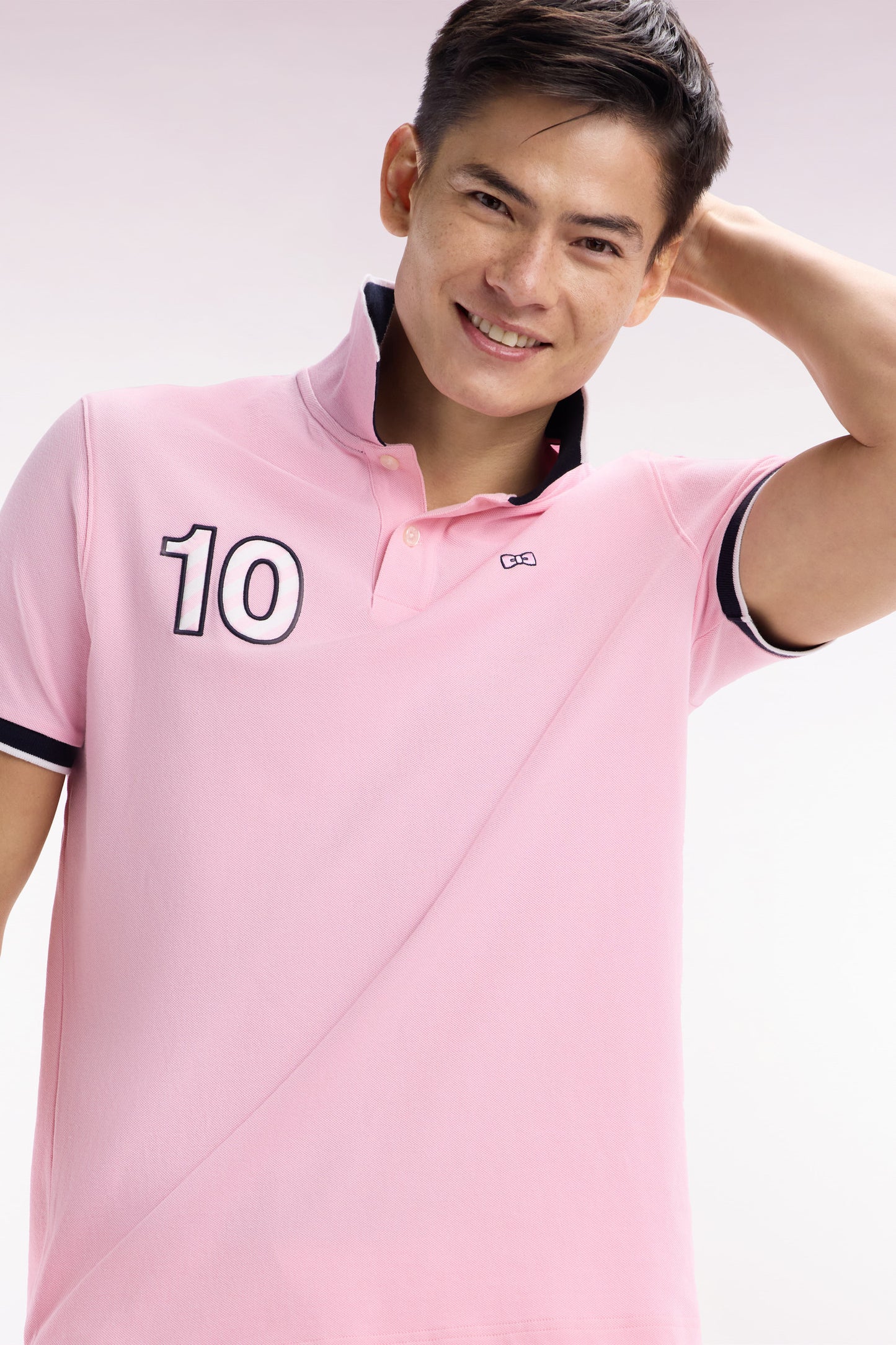 Relaxed-fit short-sleeved polo shirt in pink cotton with 10 embroidery