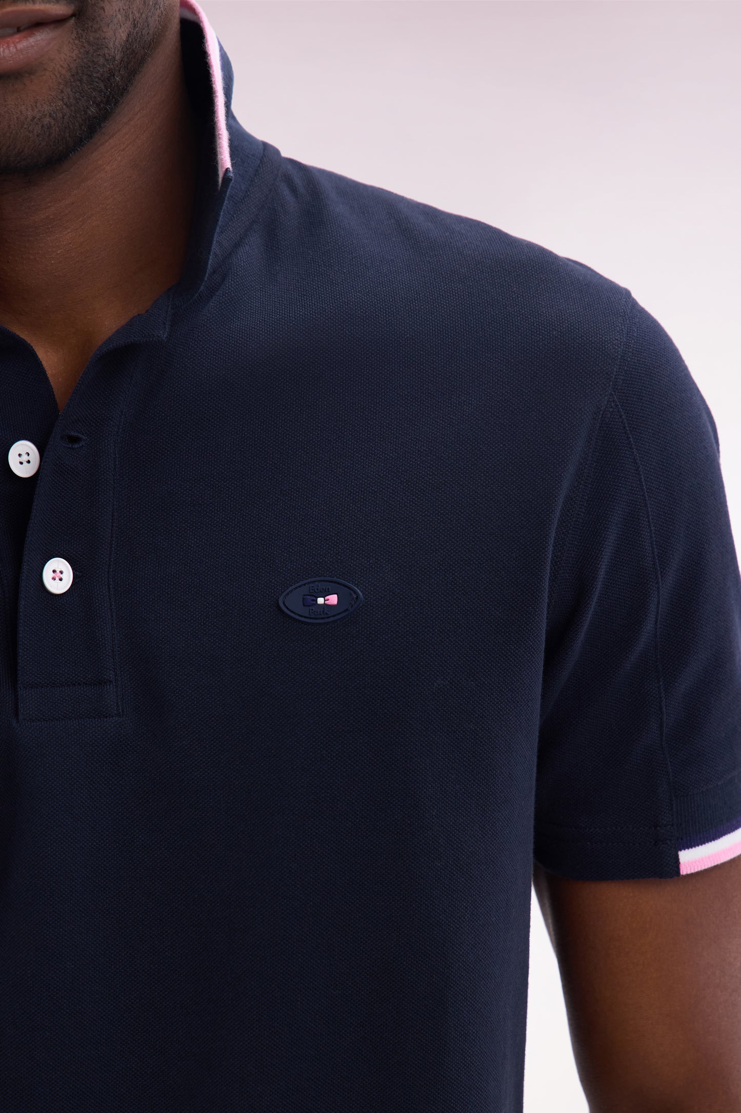 Straight-cut short-sleeved polo shirt in navy cotton with two-tone ribbed edges