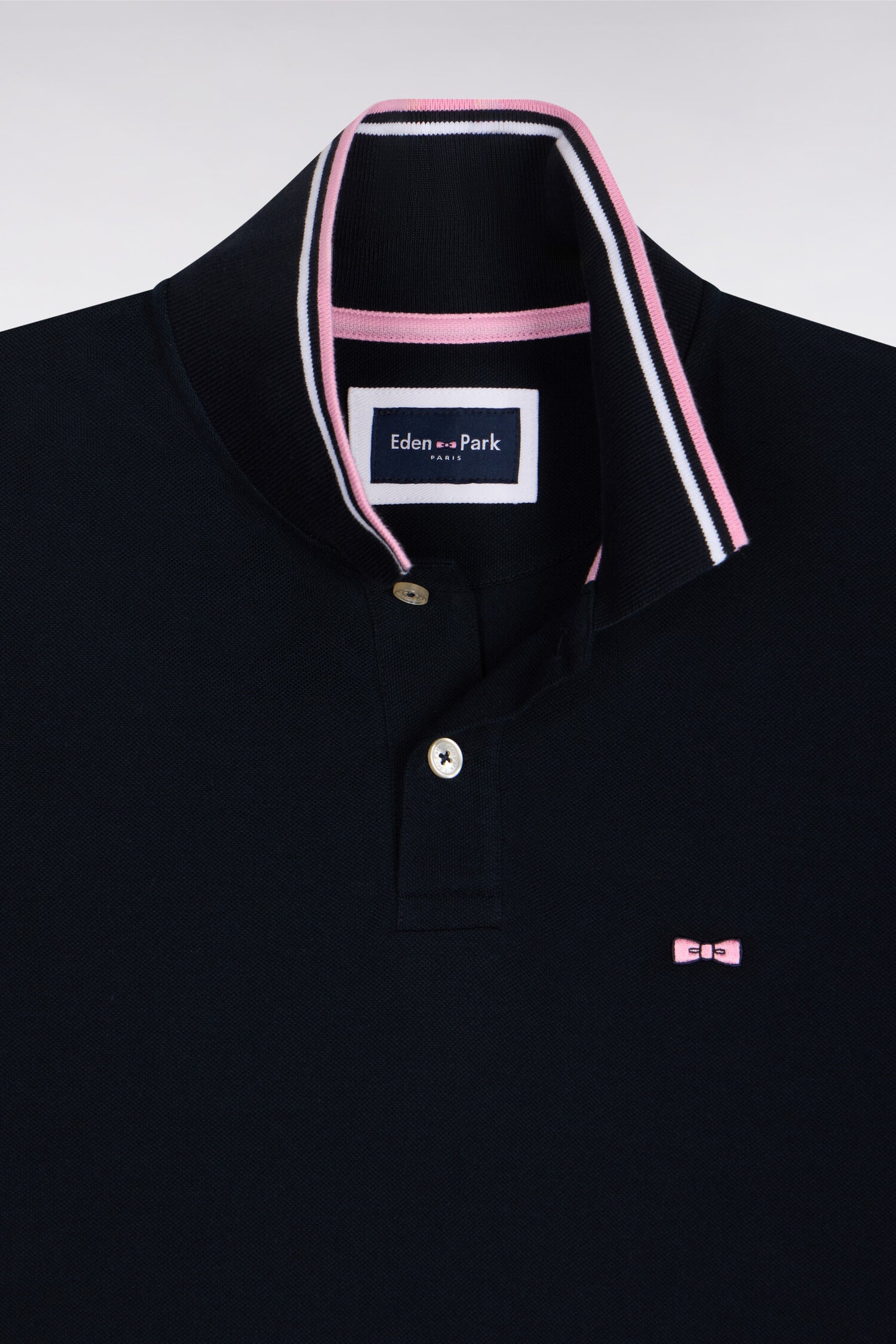 Polo manches courtes en coton marine détails rayés coupe regular