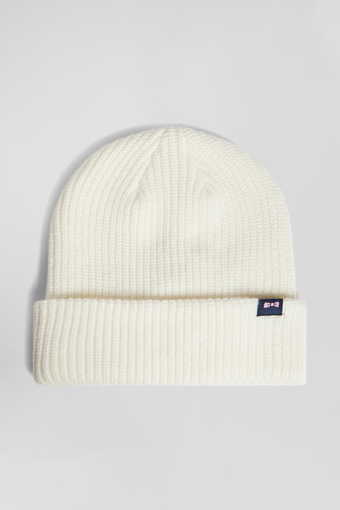 Ivory knitted beanie with bow tie embroidery - Image 1