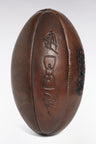 Brown cowhide rugby ball