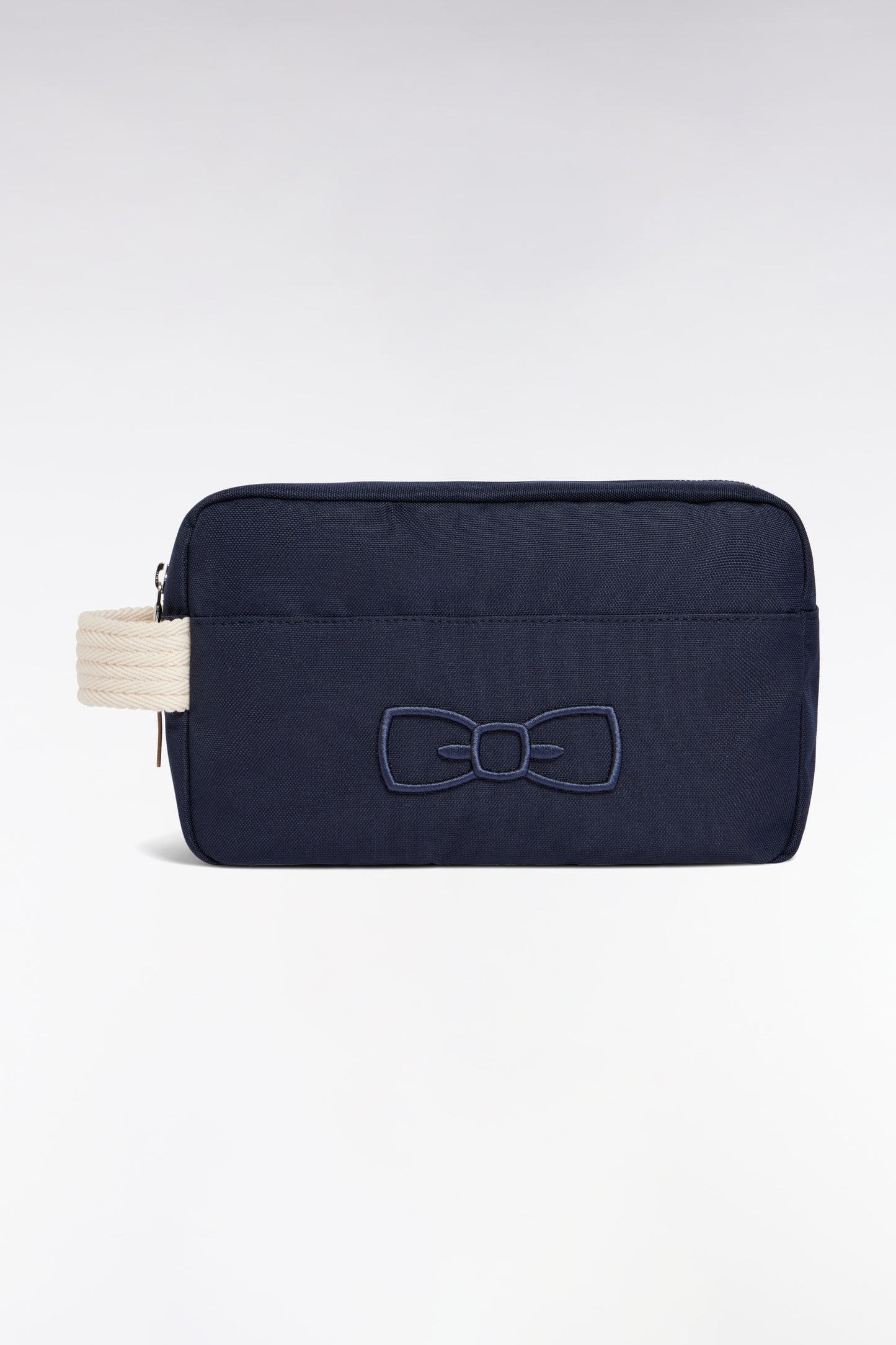 Toiletry bag in navy canvas with bow tie embroidery