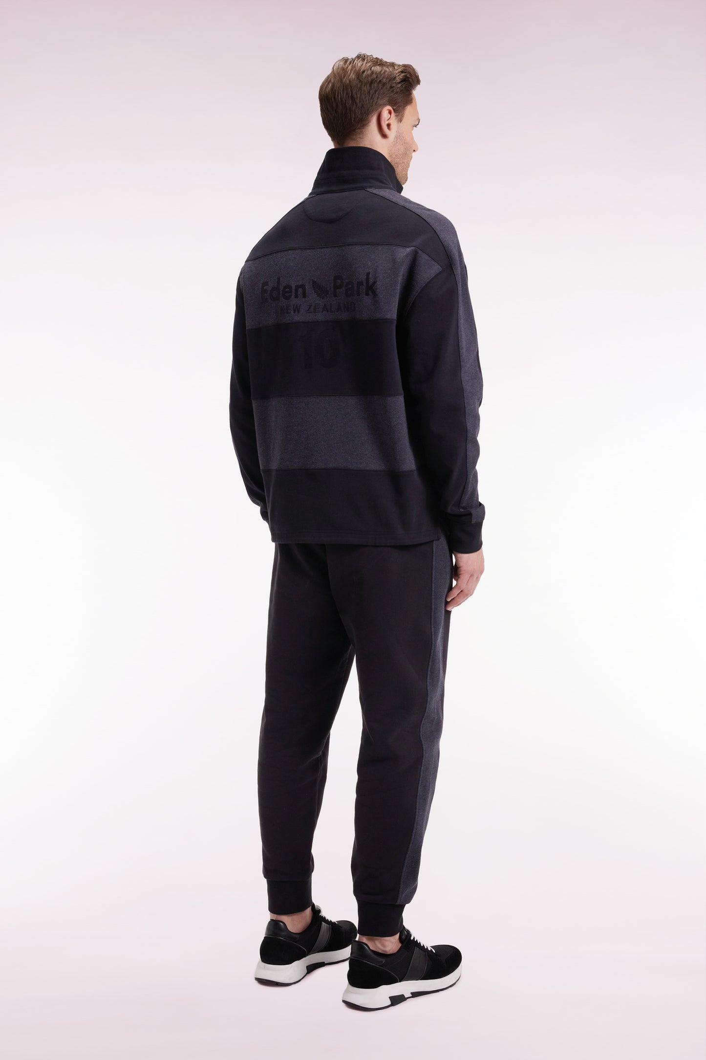 Black brushed fleece jogging suit with striped pockets Relaxed cut