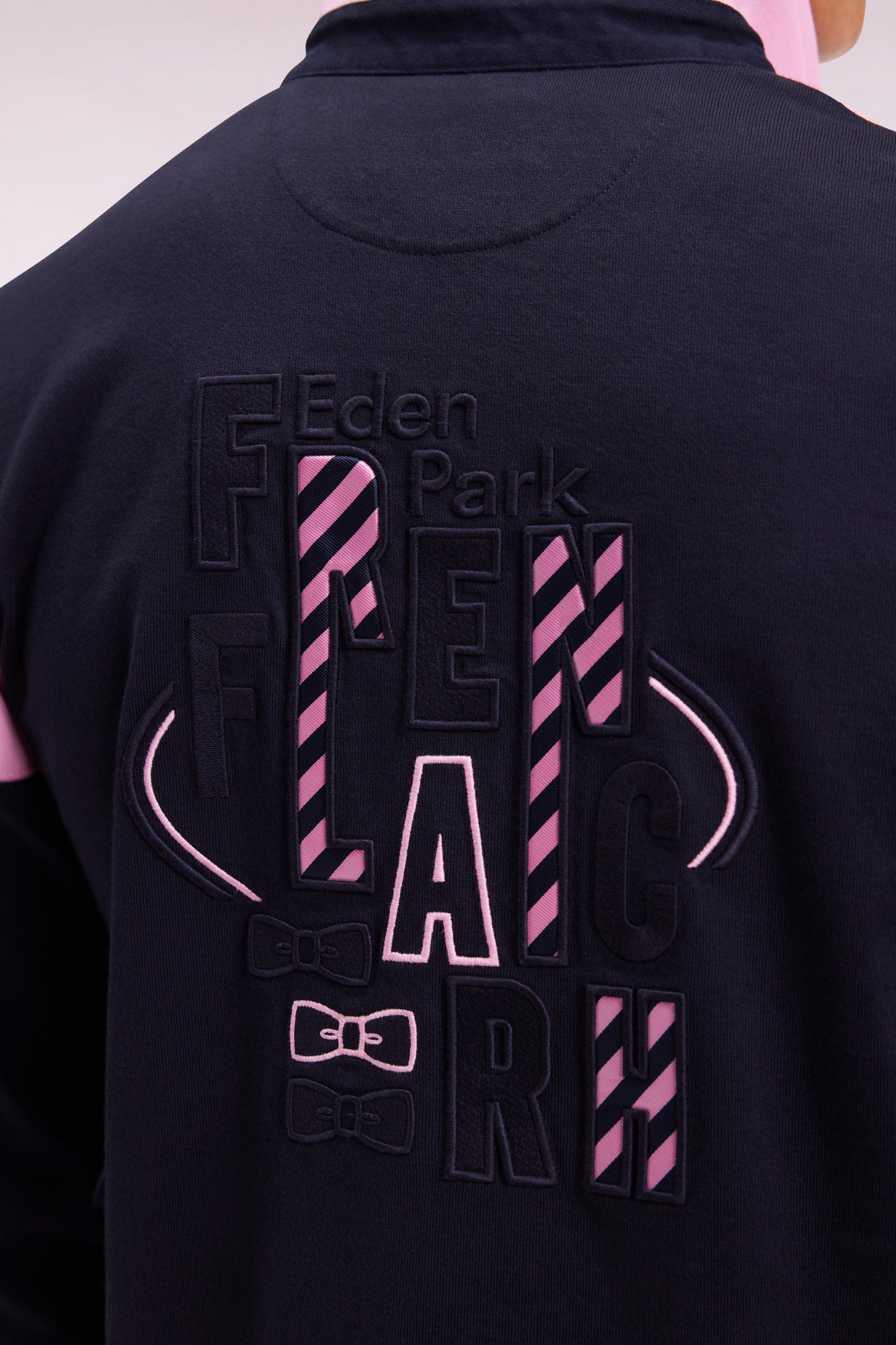 Long-sleeved jersey in two-tone navy and pink, straight cut