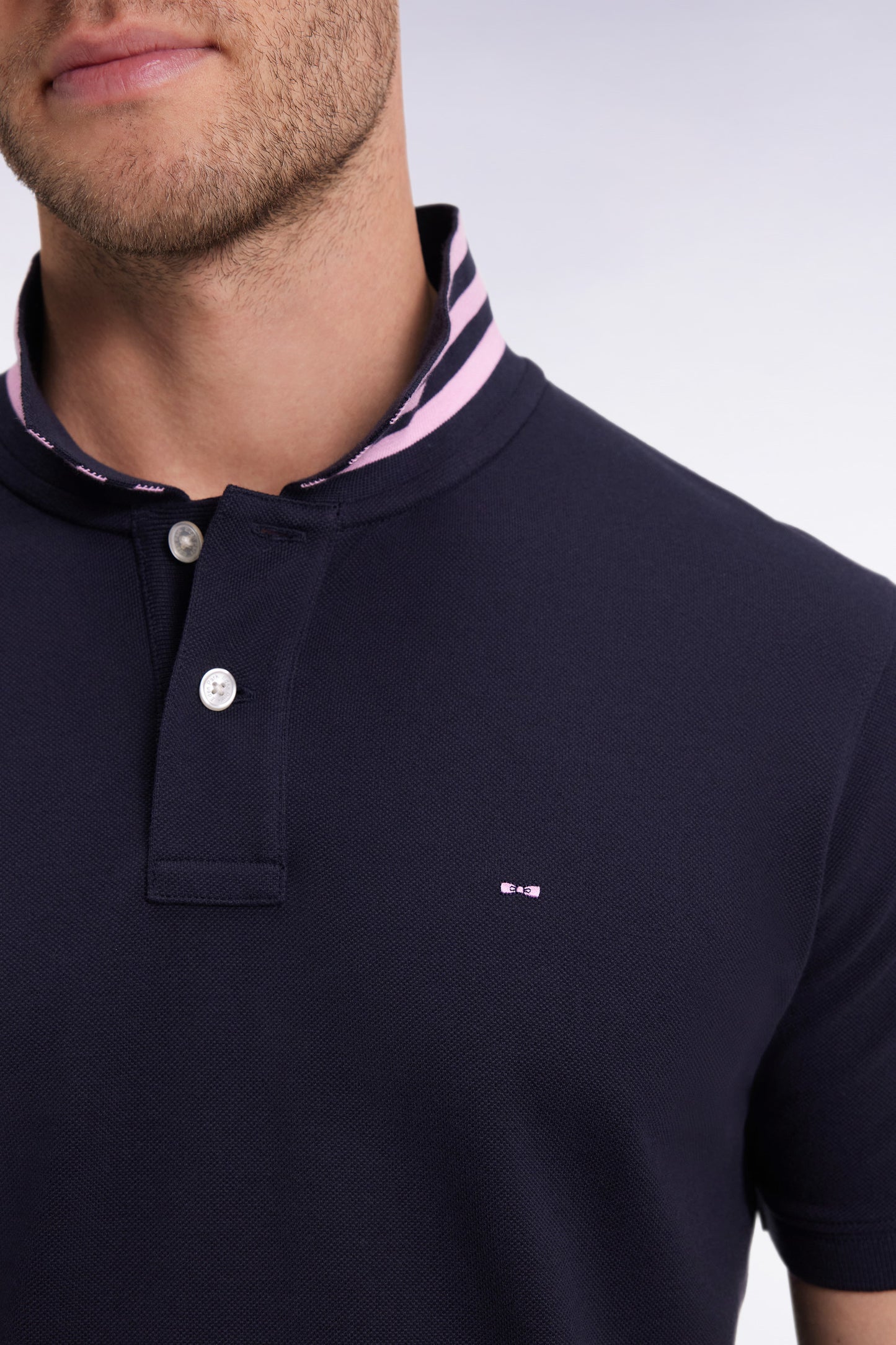 Short-sleeved polo shirt in navy Pima cotton with striped undercollar, straight cut