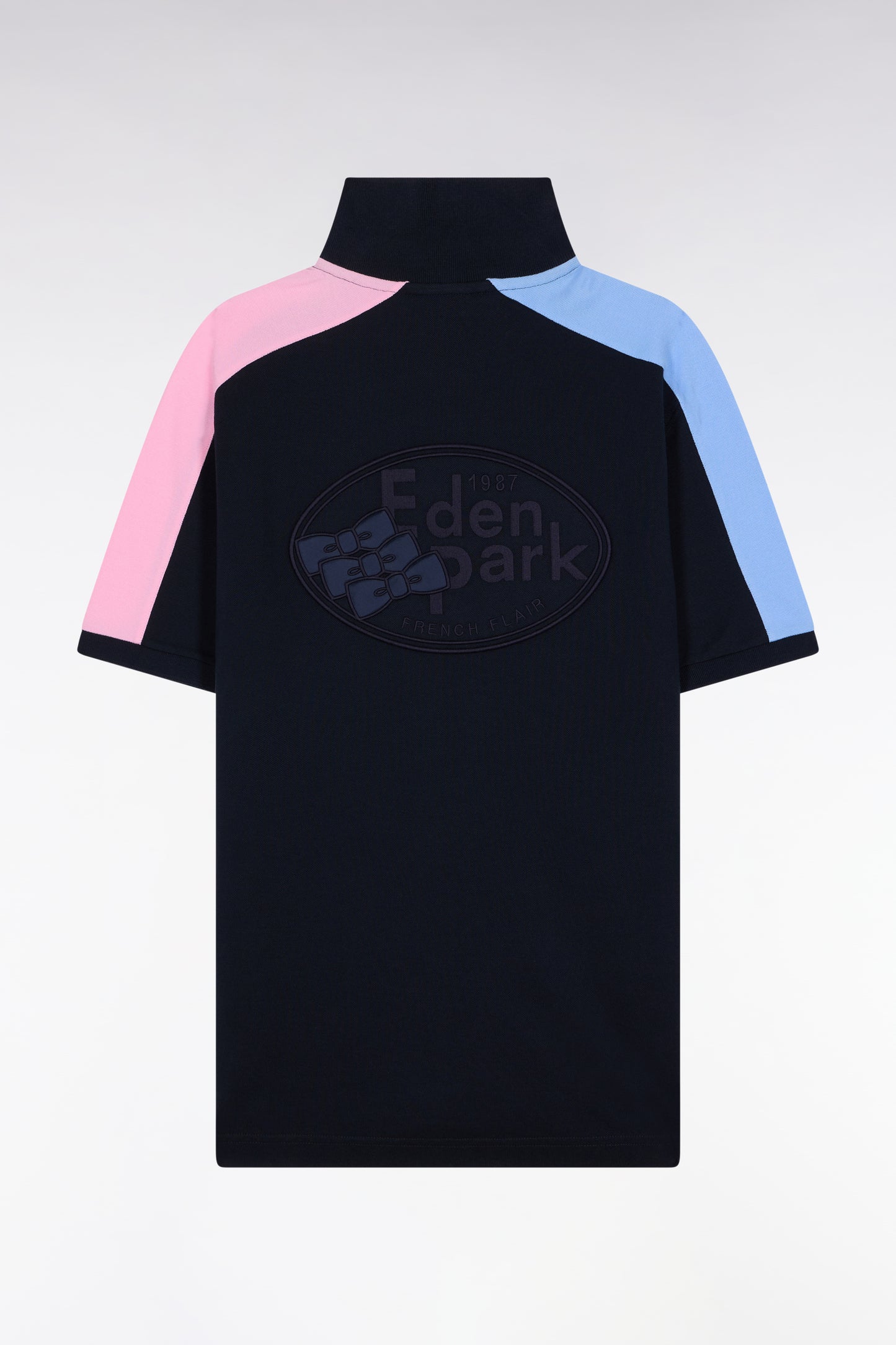 Short-sleeved polo shirt in navy cotton piqué with tricolored cut-outs