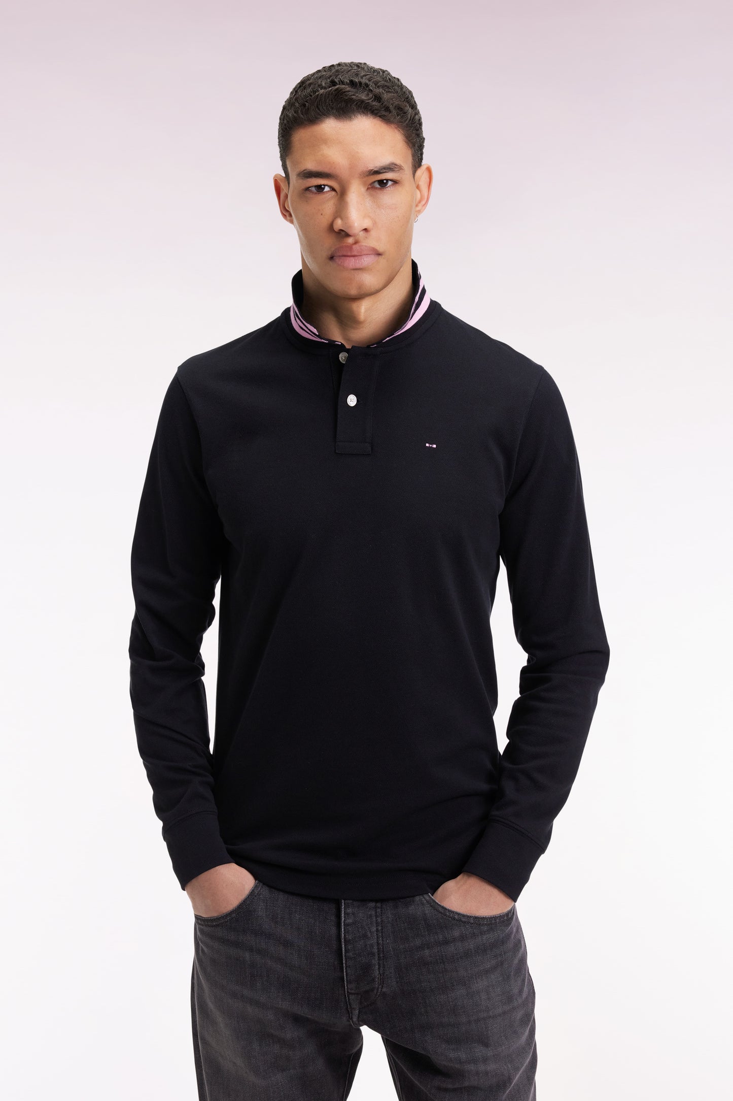 Long-sleeved polo shirt in black cotton piqué with striped collar.