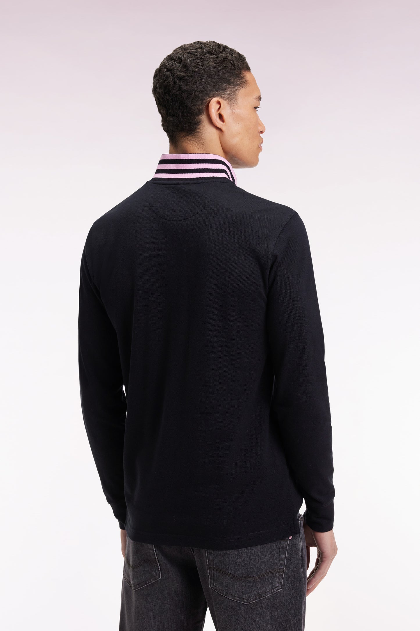 Long-sleeved polo shirt in black cotton piqué with striped collar.