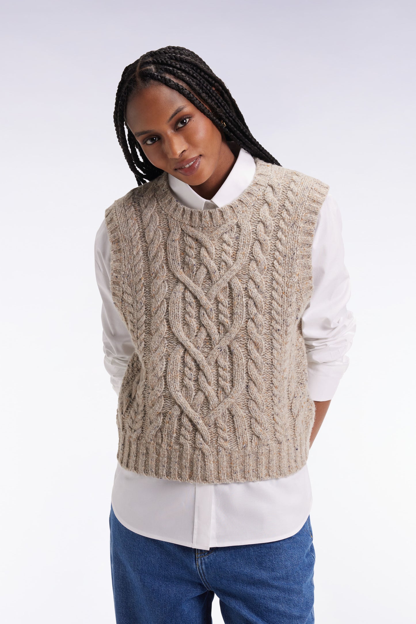 Sleeveless virgin wool blend sweater in beige Relaxed cut