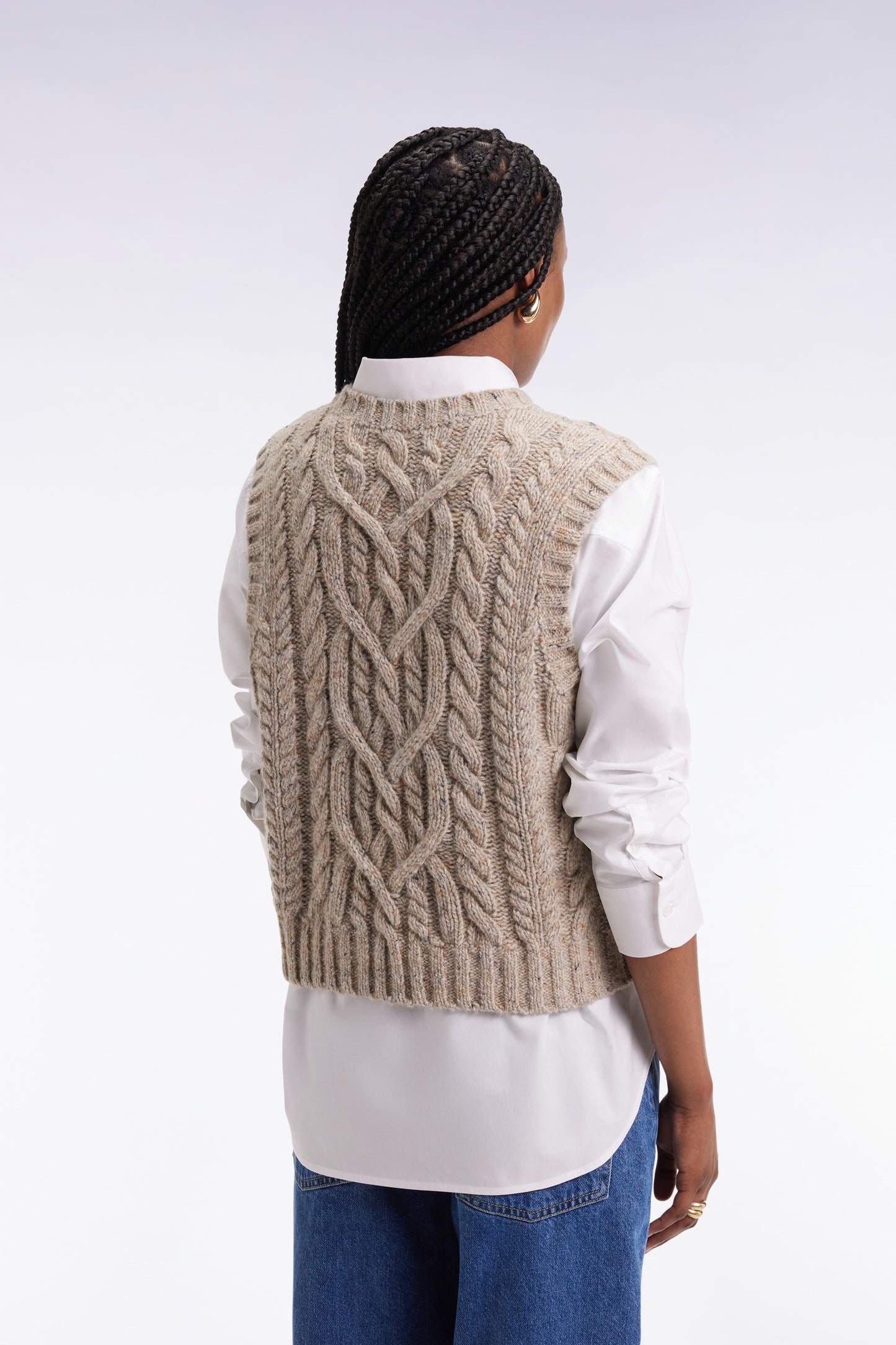 Sleeveless virgin wool blend sweater in beige Relaxed cut