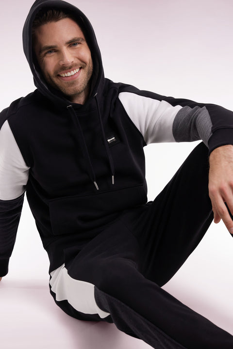 Black hooded sweatshirt with contrasting cut-out sleeves - Image 1