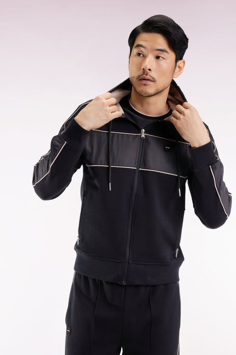 Zip-up hooded sweatshirt in black and beige fleece and nylon - Image 1