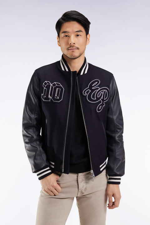 Two-tone teddy jacket with navy leather sleeves - Image 1