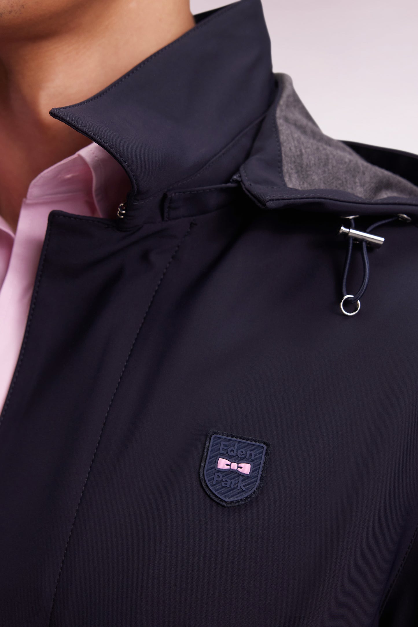 Long raincoat in navy double-faced jersey with removable hood