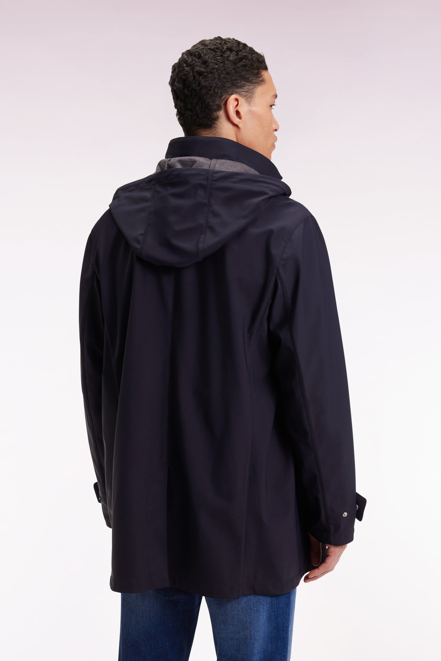 Long raincoat in navy double-faced jersey with removable hood
