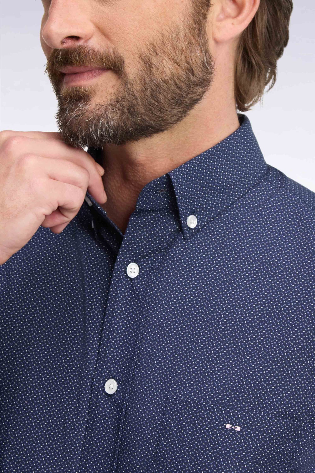 Navy cotton shirt with micro-patterned bow ties, straight cut