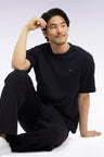 Unisex short-sleeved round-neck t-shirt in black mercerized cotton, loose fit