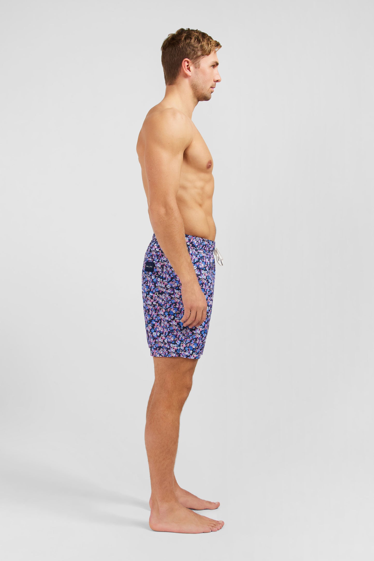 Pink swim shorts with exclusive floral print