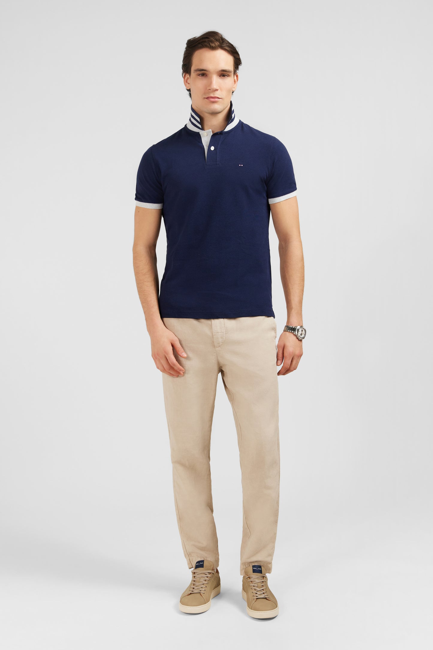 Navy blue short-sleeved polo shirt