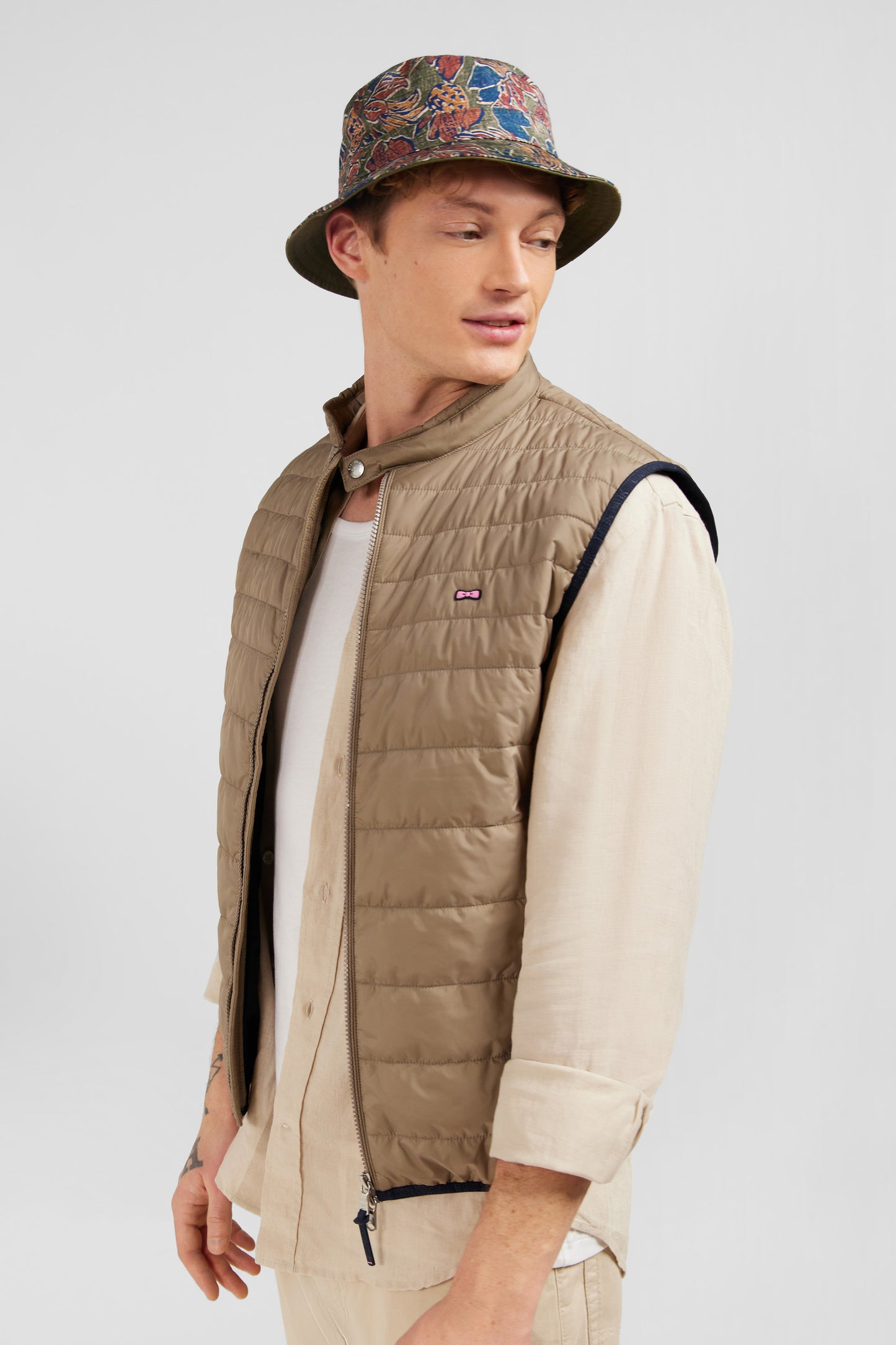 Beige sleeveless puffa jacket