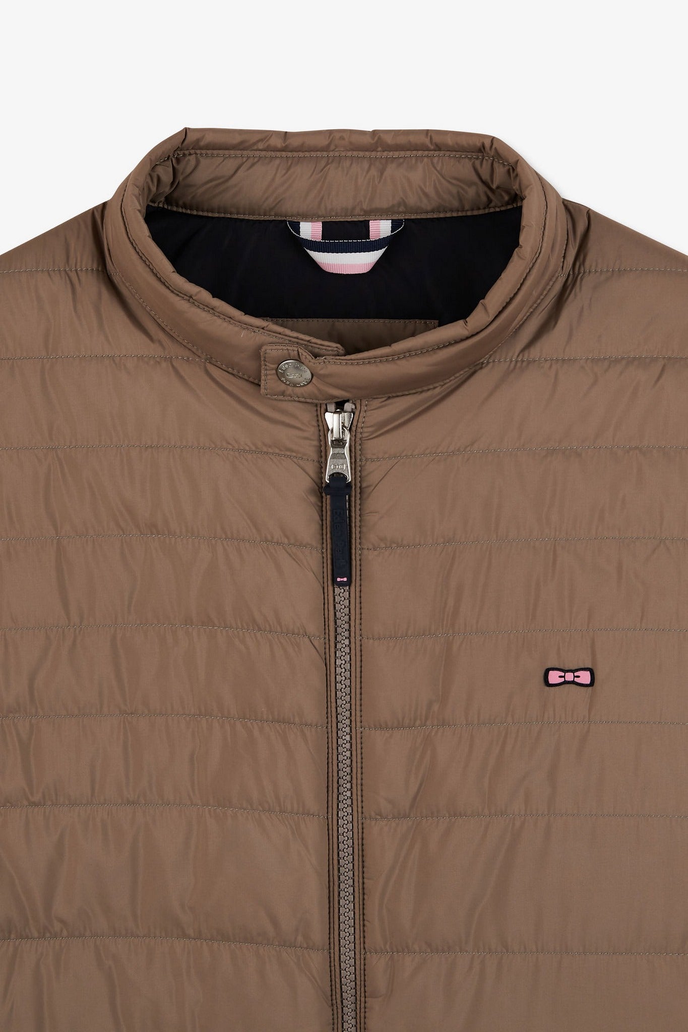 Beige sleeveless puffa jacket