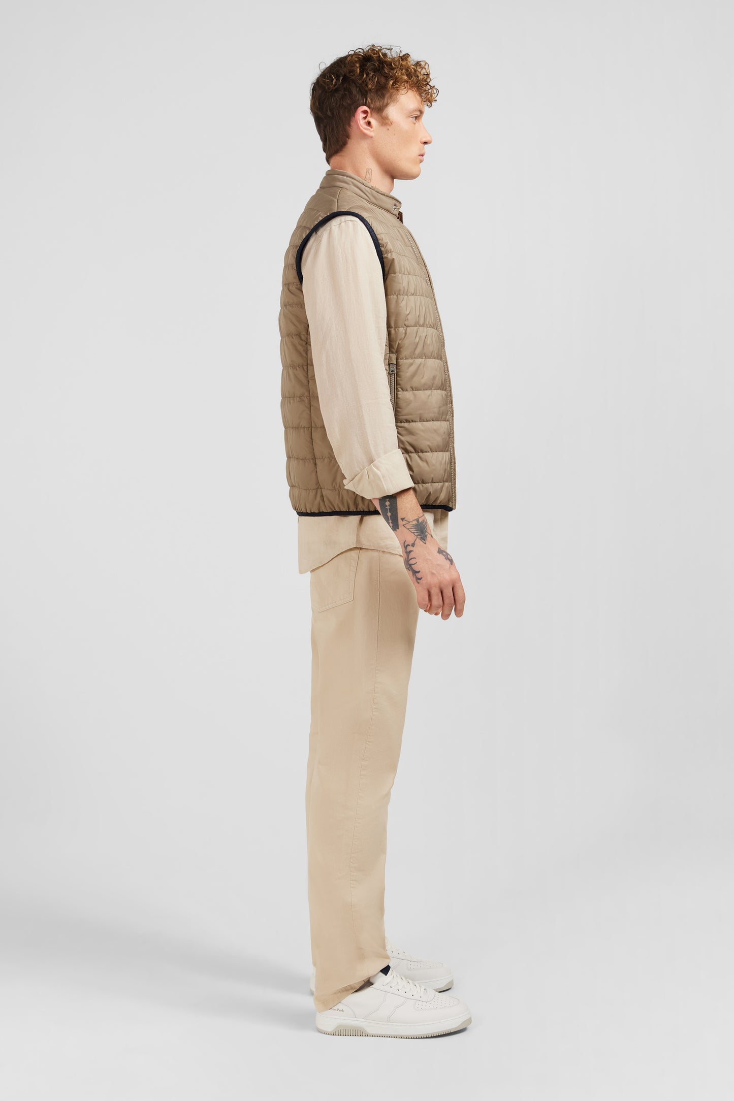 Beige sleeveless puffa jacket