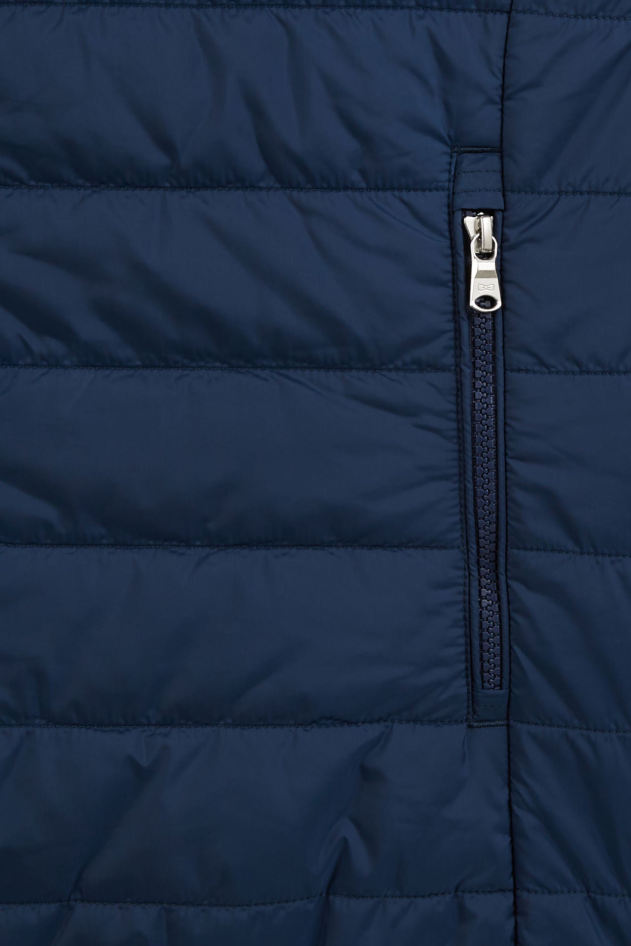 Blue sleeveless puffa jacket