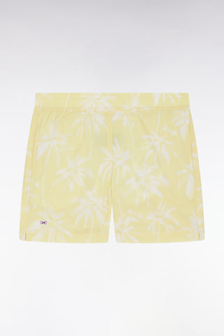 Yellow children's swimsuit with palm tree print