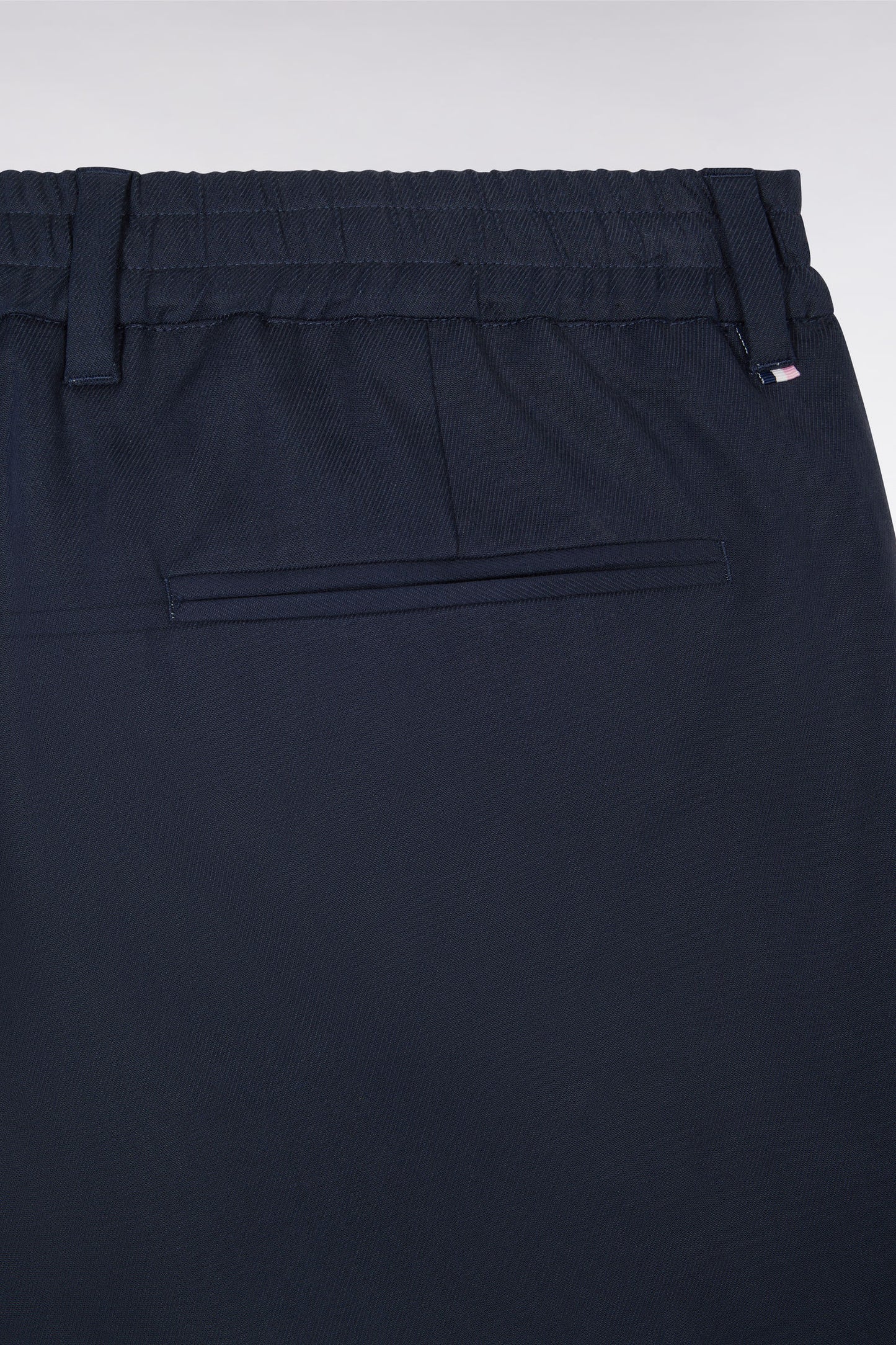 Elastic trousers in navy lyocell and stretch cotton