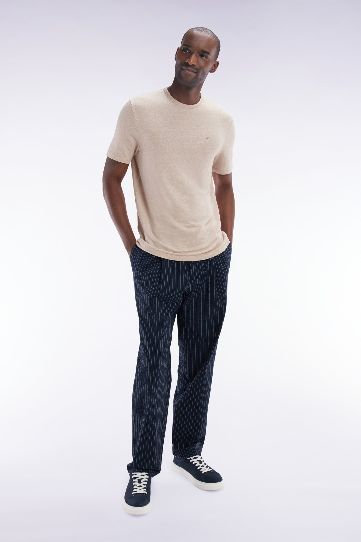 Navy stretch cotton seersucker trousers with tennis stripe