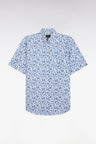 Straight short-sleeved blue shirt in cotton poplin with vegetal print